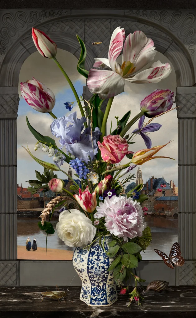 A bouquet of tulips, roses and iris in a Delft blue vase before a window opening onto a Dutch landscape.