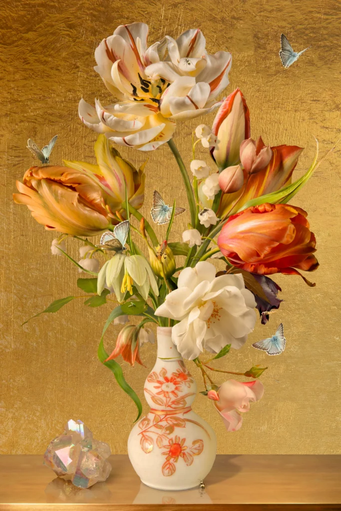 White and orange parrot tulips in a white vase with orange decoration against a gold-leaf ground, with butterflies.